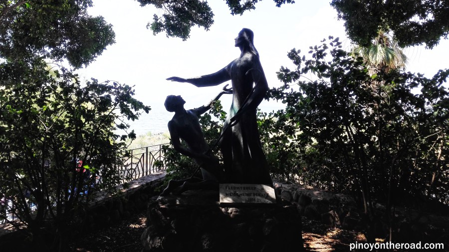 Statue representing "Go and Feed My Sheep" located near the Sea of Galilee in the Church of the Primacy of Peter